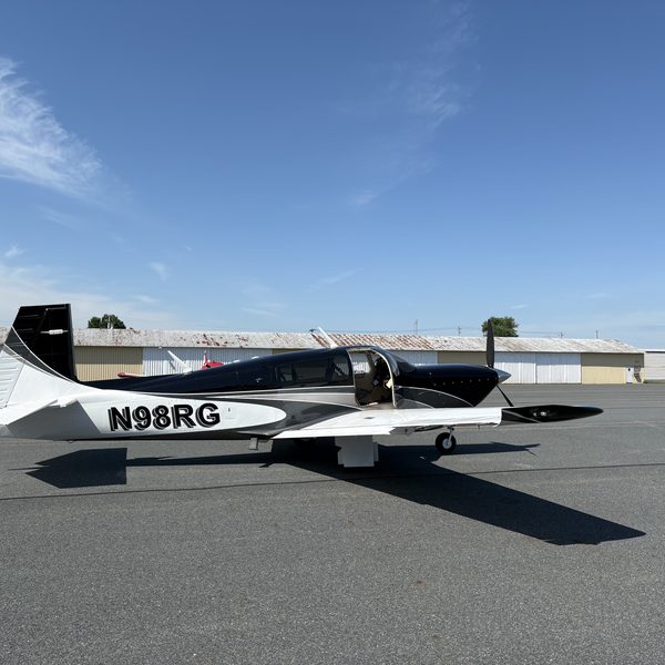 Dan Brousseau with airplane (optional testimonial photo)