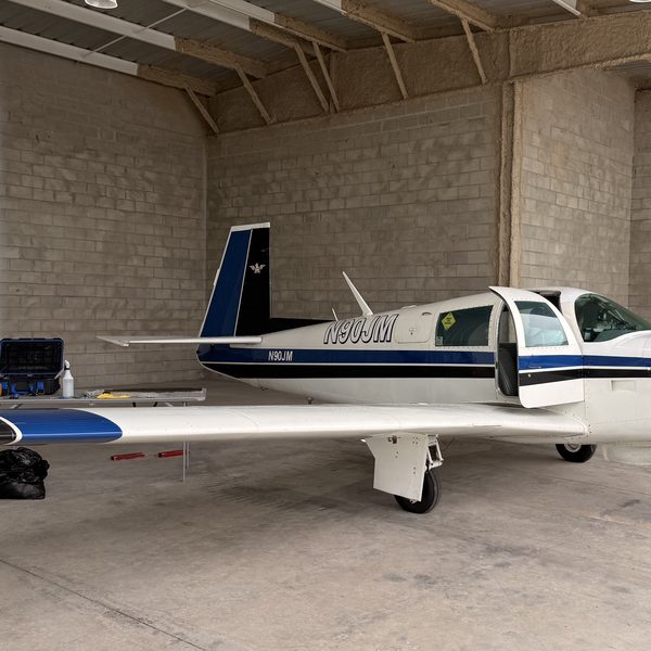 Bob Noriega with airplane (optional testimonial photo)
