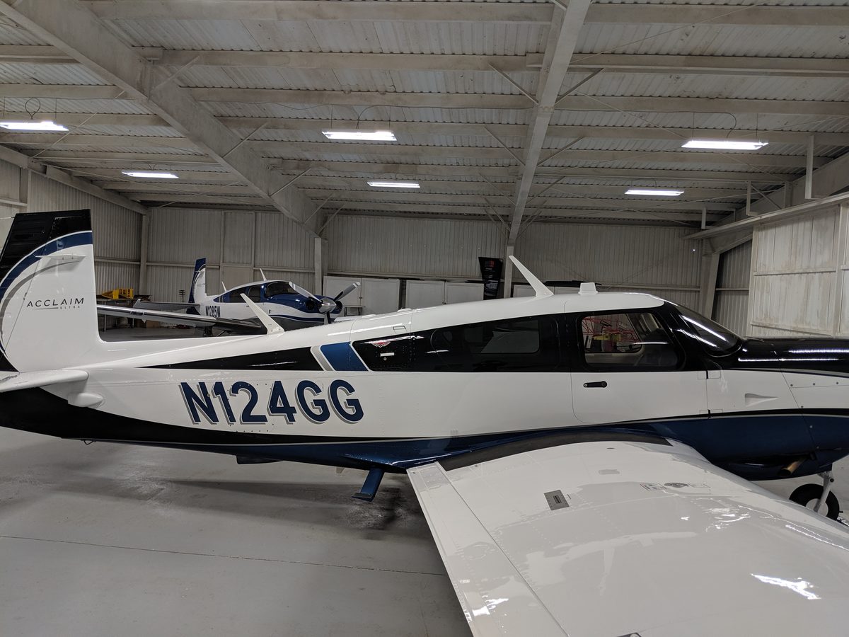 training flight, instructor and pilot in a Mooney cockpit